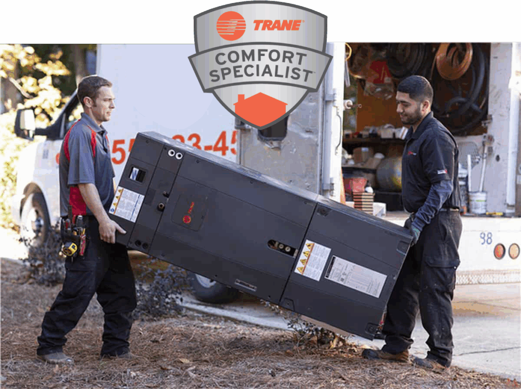Two technicians lift an HVAC unit outside, with a van in the background. A Trane Comfort Specialist badge is shown above them.